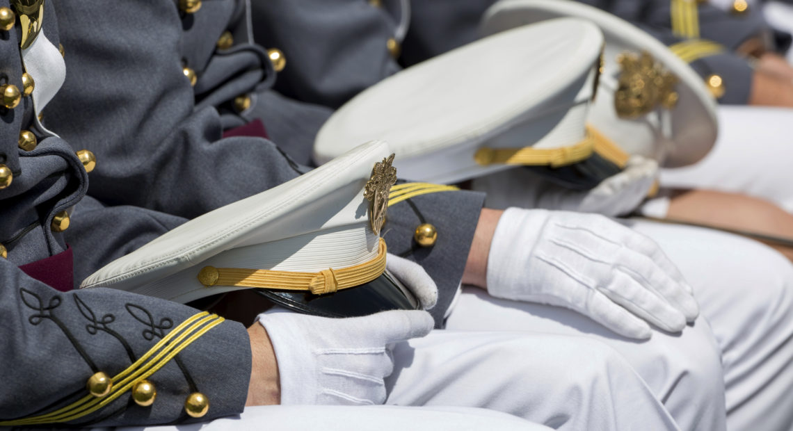 At last year's commencement, before the novel coronavirus, West Point cadets celebrated graduation in tight rows. Julius Motal/AP