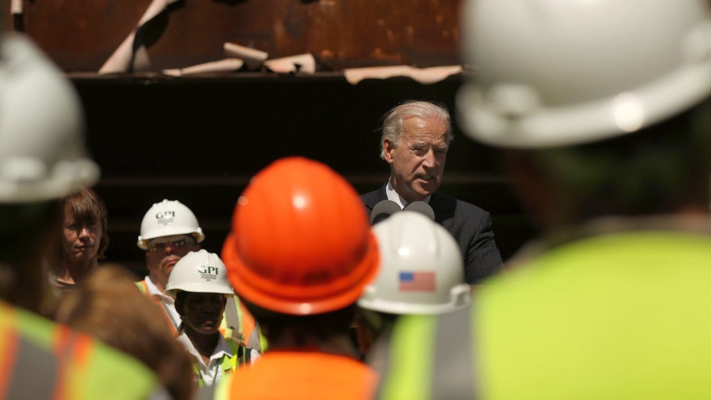 In 2010, Vice President Joe Biden speaks to construction workers at the Brooklyn Bridge, marking a renovation project which was partly funded by money from the 2009 Recovery Act. Spencer Platt/Getty Images