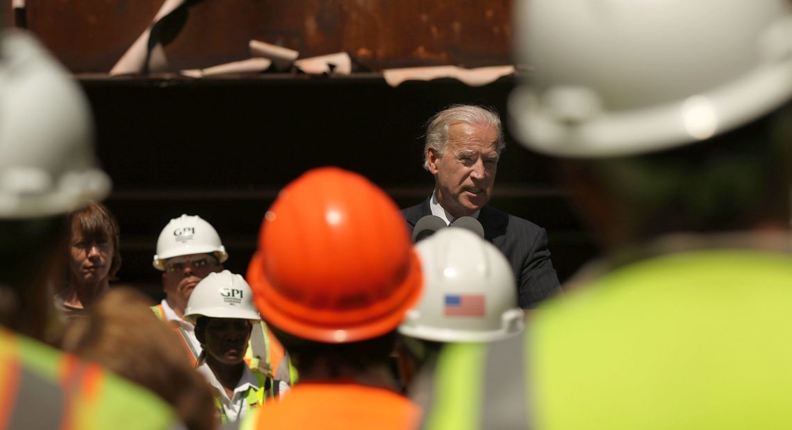In 2010, Vice President Joe Biden speaks to construction workers at the Brooklyn Bridge, marking a renovation project which was partly funded by money from the 2009 Recovery Act. Spencer Platt/Getty Images