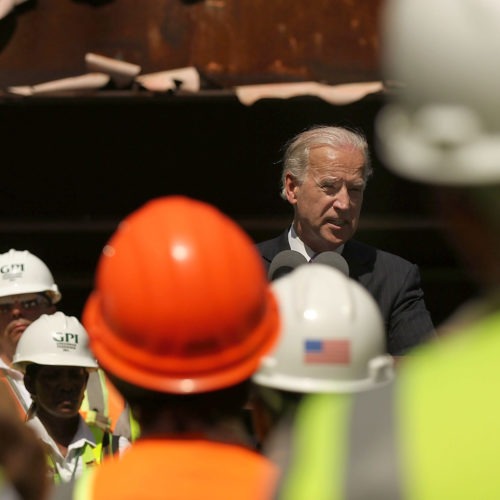 In 2010, Vice President Joe Biden speaks to construction workers at the Brooklyn Bridge, marking a renovation project which was partly funded by money from the 2009 Recovery Act. Spencer Platt/Getty Images