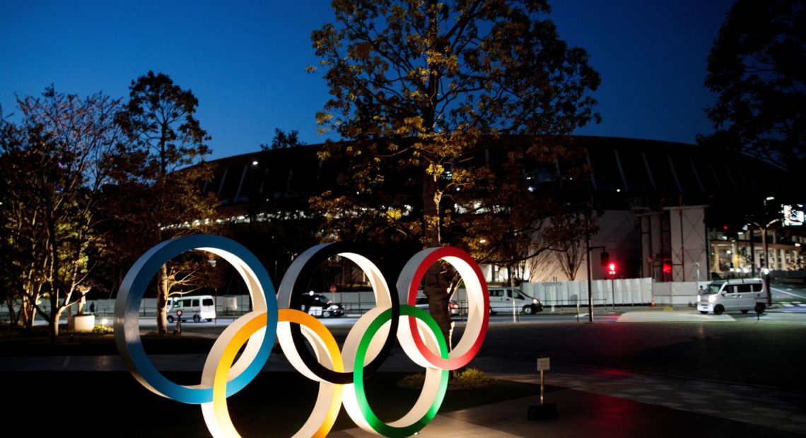 The Olympic rings displayed outside the National Stadium