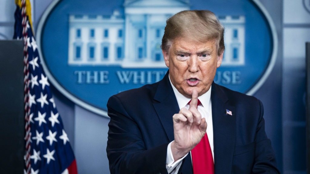 "When somebody's the president of the United States, the authority is total," President Trump said on Monday. Jabin Botsford/The Washington Post via Getty Images