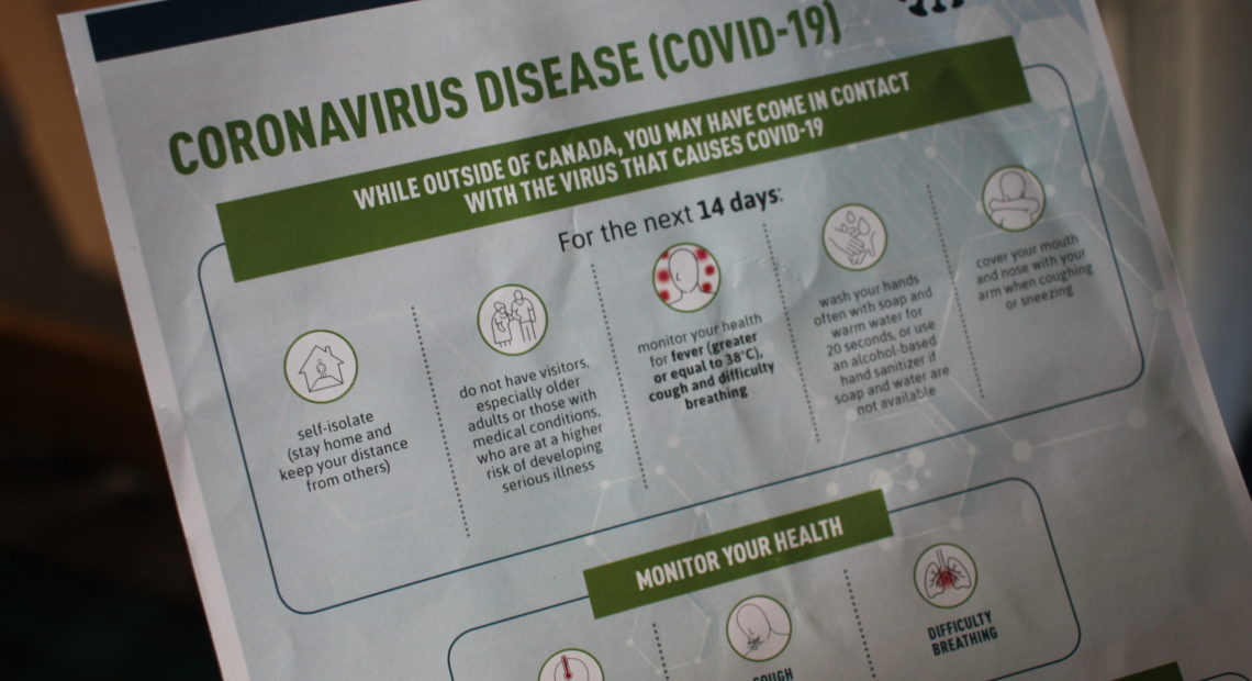 Canadian border agents are handing people entering Canada a sheet from the Public Health Agency of Canada that instructs them to self-quarantine for 14 days and monitor themselves for any symptoms that might signal COVID-19. Selena Simmons-Duffin/NPR