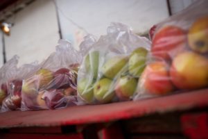 Apples for sale at the Liepold Farms produce stand in Boring, Ore., on Friday, April 3, 2020.