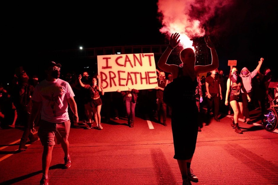 Demonstrators marched through the streets of Portland, Ore., Friday, May 29, 2020, joining nationwide protests against the killing of George Floyd at the hands of Minneapolis police. CREDIT: Jonathan Levinson/OPB