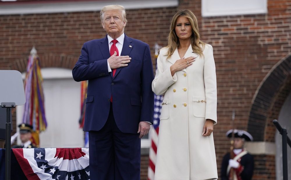 President Donald Trump and first lady Melania Trump participate in a Memorial Day ceremony at Fort McHenry National Monument and Historic Shrine, Monday, May 25, 2020, in Baltimore. CREDIT: Evan Vucci/AP