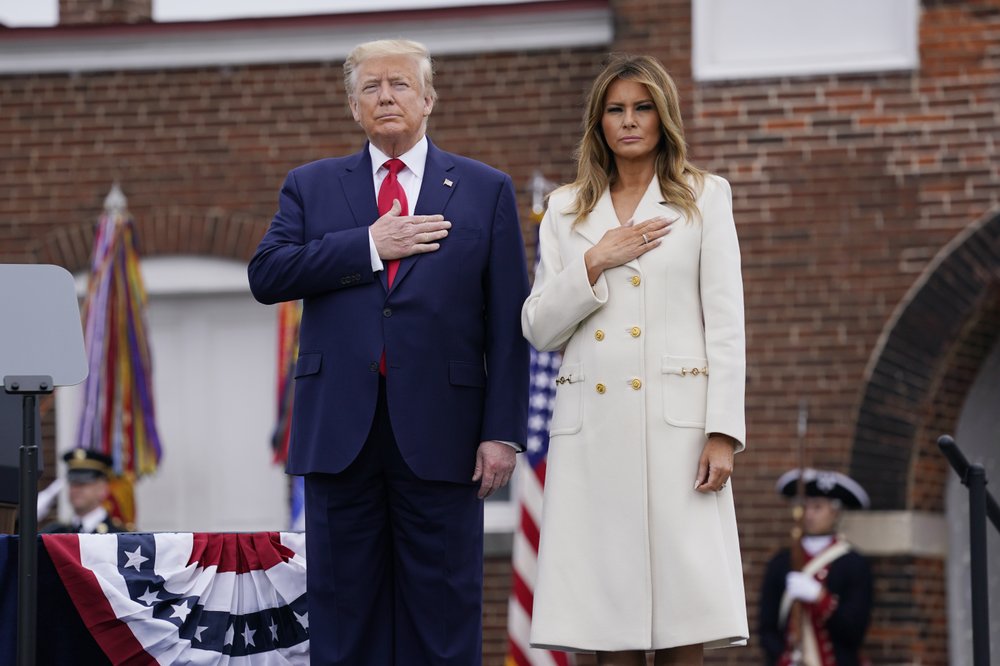 President Donald Trump and first lady Melania Trump participate in a Memorial Day ceremony at Fort McHenry National Monument and Historic Shrine, Monday, May 25, 2020, in Baltimore. CREDIT: Evan Vucci/AP