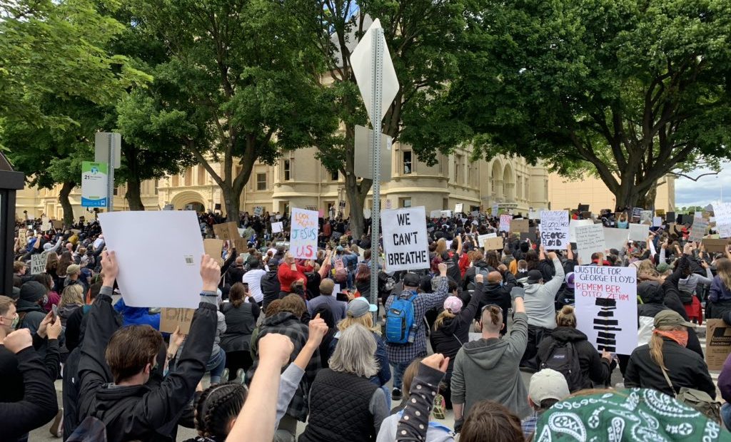 Protesters gather at the Spokane County Courthouse Sunday, May 31, 2020 as part of nationwide demonstrations in cities against police killings. The Spokane event started in the city's downtown Riverfront Park, with several thousand people marching peacefully in streets across the city's Monroe Street Bridge to the courthouse. CREDIT: Nick Deshais/N3