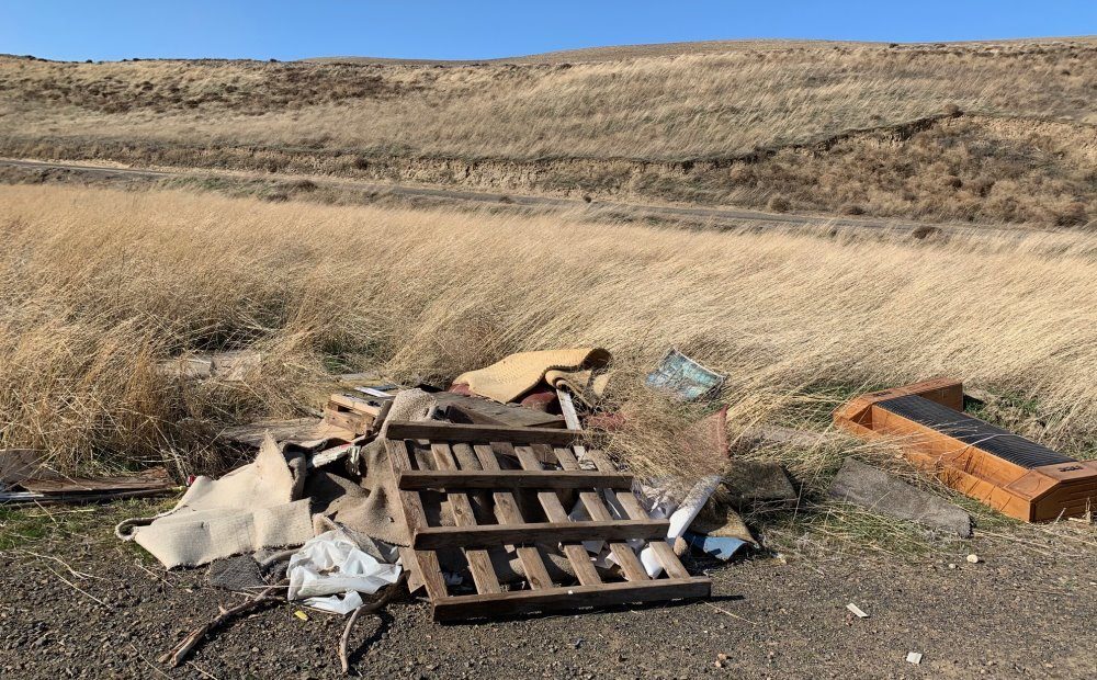 Cyclists found a pile of trash near the roadside south of Kennewick. Cyclist Mike Robinson says he’s seen more trash dumped by the edge of the road since the pandemic started. Courtesy of Mike Robinson