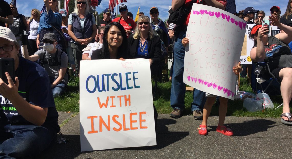 Gov. Jay Inslee was the focus of ire at a 'Hazardous Liberty' rally at the Washington Capitol on Saturday. In recent weeks, Inslee has faced growing criticism from Republicans for his response to the COVID-19 crisis.