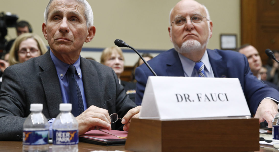 Dr. Anthony Fauci, director of the National Institute of Allergy and Infectious Diseases, and CDC Director Robert Redfield