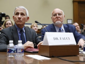 Dr. Anthony Fauci, director of the National Institute of Allergy and Infectious Diseases, and CDC Director Robert Redfield