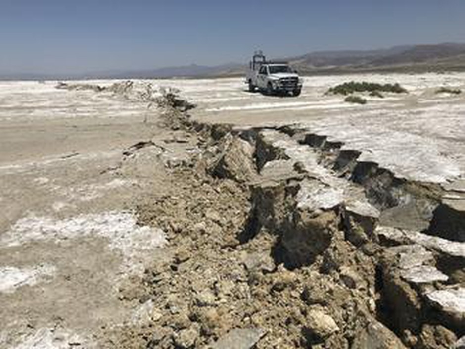 USGS scientists examine a surface rupture created during the M7.1 Searles Valley earthquake in 2019.