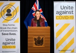 Jacinda Ardern, the prime minister of New Zealand, briefs the media on COVID-19. She did not refer to the coronavirus as an invisible enemy but issued a call for New Zealanders to protect each other from the health threat.
