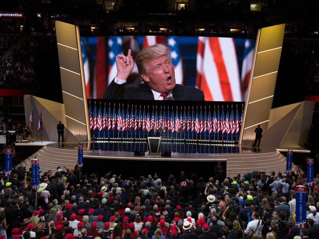 Donald Trump delivers the keynote address during the 2016 Republican National Convention. Despite the coronavirus, Republicans say they are moving ahead with plans for their 2020 convention. CREDIT: David Hume Kennerly/Getty Images