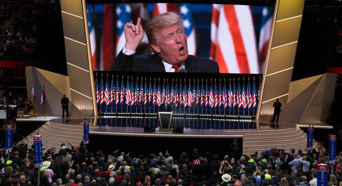 Donald Trump delivers the keynote address during the 2016 Republican National Convention. Despite the coronavirus, Republicans say they are moving ahead with plans for their 2020 convention. CREDIT: David Hume Kennerly/Getty Images