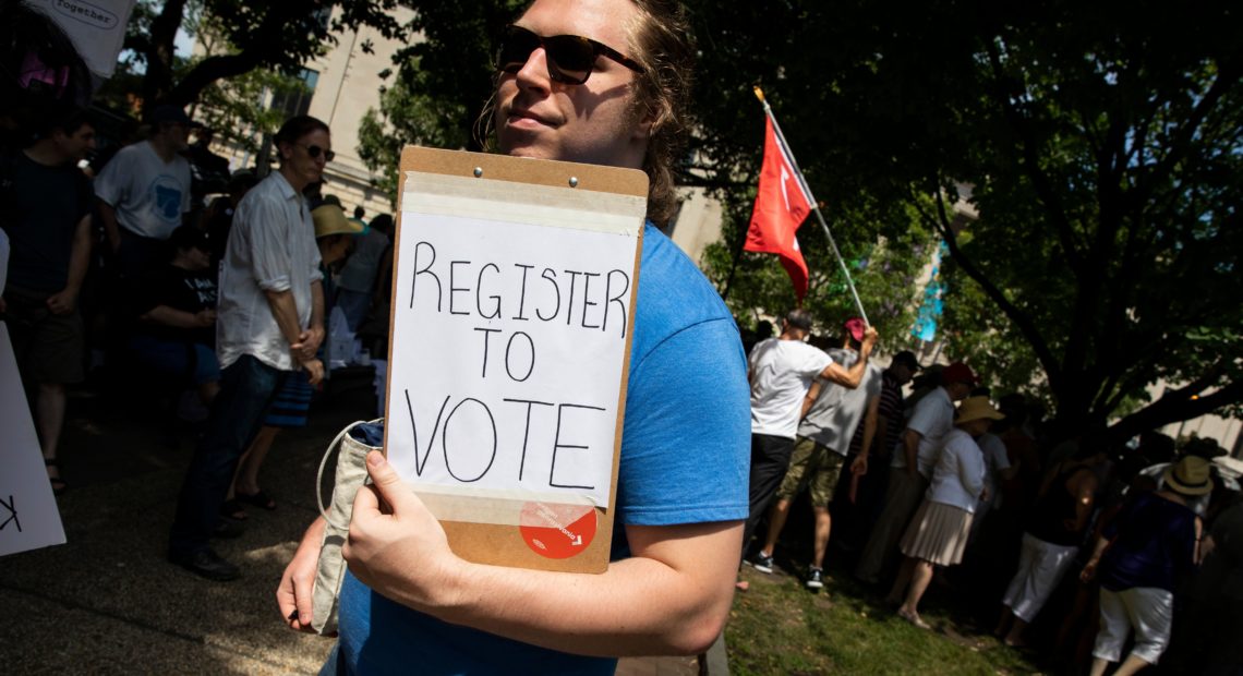 A voter registration volunteer in Philadelphia in 2018. New registrations had surged going into 2020 but have dropped off dramatically as a result of the coronavirus pandemic.