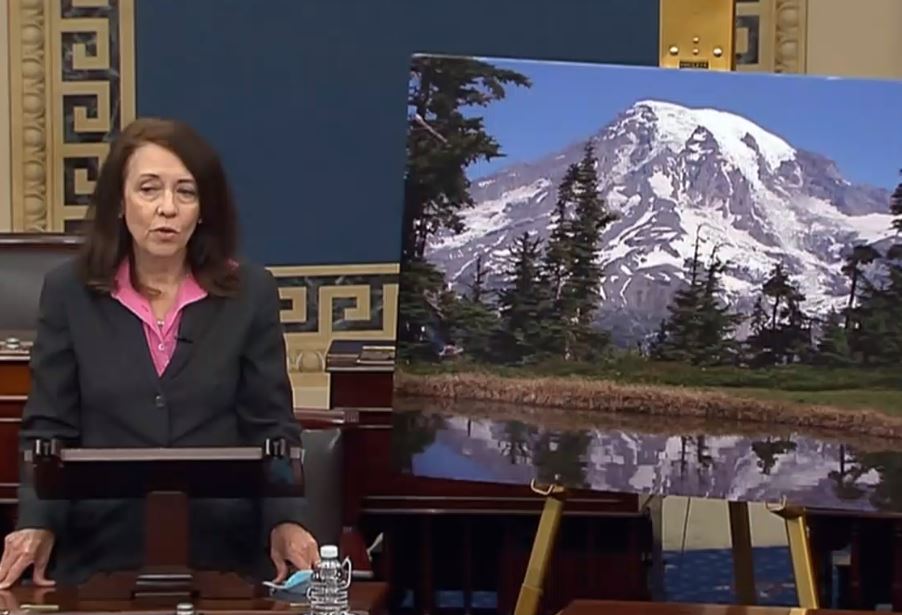Washington Democratic Sen. Maria Cantwell helped push through the Great American Outdoors Act, speaking on the Senate floor with a picture of Mount Rainier on June 17, 2020. Screenshot / Courtesy of U.S. Senate