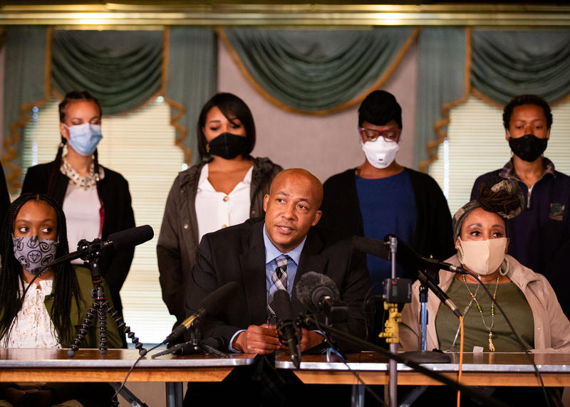 The family of Manuel Ellis and their attorney, James Bible, address reporters during a news conference Tuesday in Tacoma. They renewed calls for the state to lead an independent investigation into Ellis' killing on March 3. CREDIT: Parker Miles Blohm/KNKX