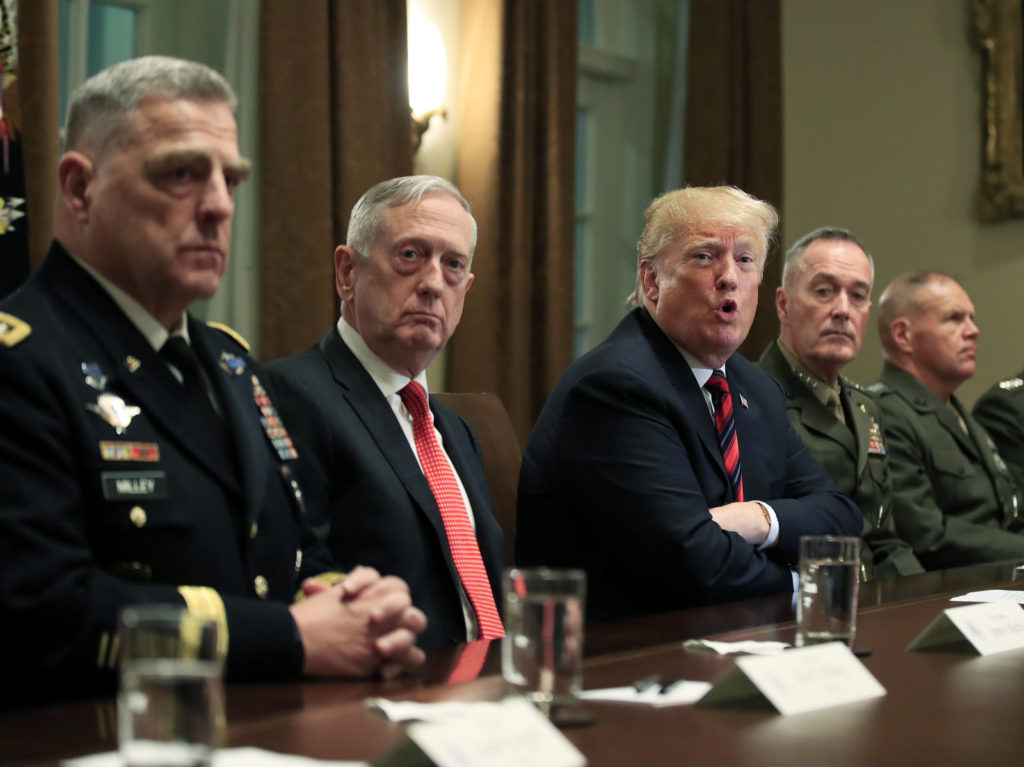 President Donald Trump in October 2018 with, from left, Army Chief of Staff Gen. Mark Milley, Defense Secretary Jim Mattis, Chairman of the Joint Chiefs of Staff Gen. Joseph Dunford and Marine Corps Commandant Gen. Robert Neller. Manuel Balce Ceneta/AP