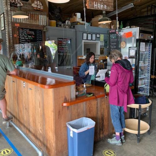 File photo. Customers flocked to the River Mile 38 brewpub in Cathlamet after it reopened its tasting room and patio in mid-May. Wahkiakum County is in the vanguard of Washington counties advancing through Safe Start reopening phases. CREDIT: Tom Banse/N3