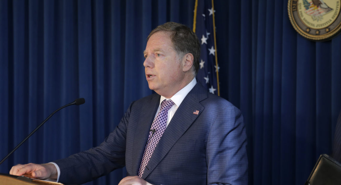 U.S. Attorney for the Southern District of New York Geoffrey Berman speaks to reporters last year about two Florida men associated with President Trump's lawyer Rudy Giuliani and the Ukraine investigation. CREDIT: Seth Wenig/AP