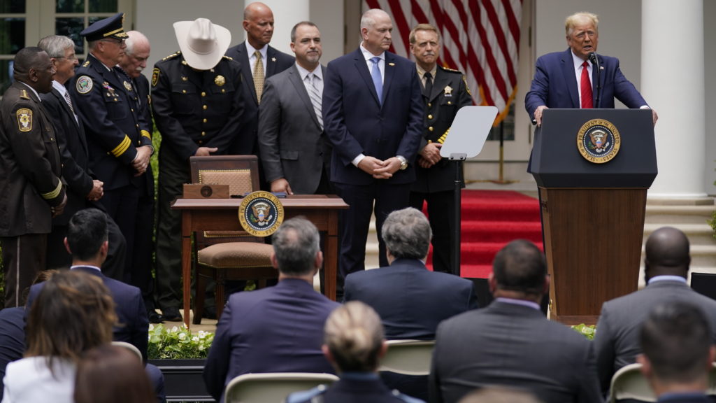 President Trump speaks during an event on police reform in the Rose Garden of the White House Tuesday. CREDIT: Evan Vucci/AP