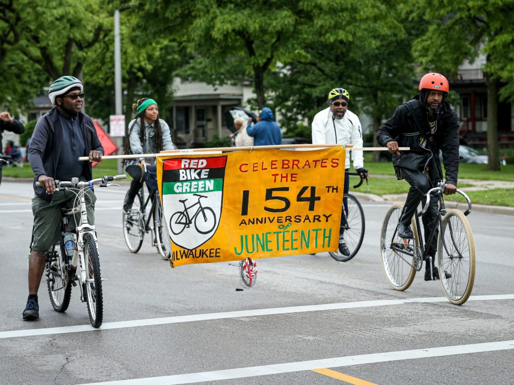 Members of a parade perform during the Juneteenth Day Festival on June 19, 2019, in Milwaukee. In the wake of protests following the killing of George Floyd, there has been a push to make Juneteenth a federal holiday. CREDIT: Dylan Buell/Getty Images for VIBE