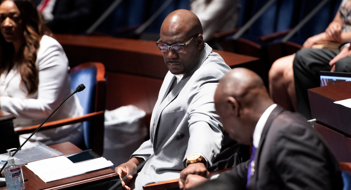 Philonise Floyd (left), brother of George Floyd, fist-bumps Ben Crump, civil rights attorney representing the Floyd family, after speaking during a hearing on Capitol Hill on Wednesday. Brendan Smialowski/Pool/AFP via Getty Images