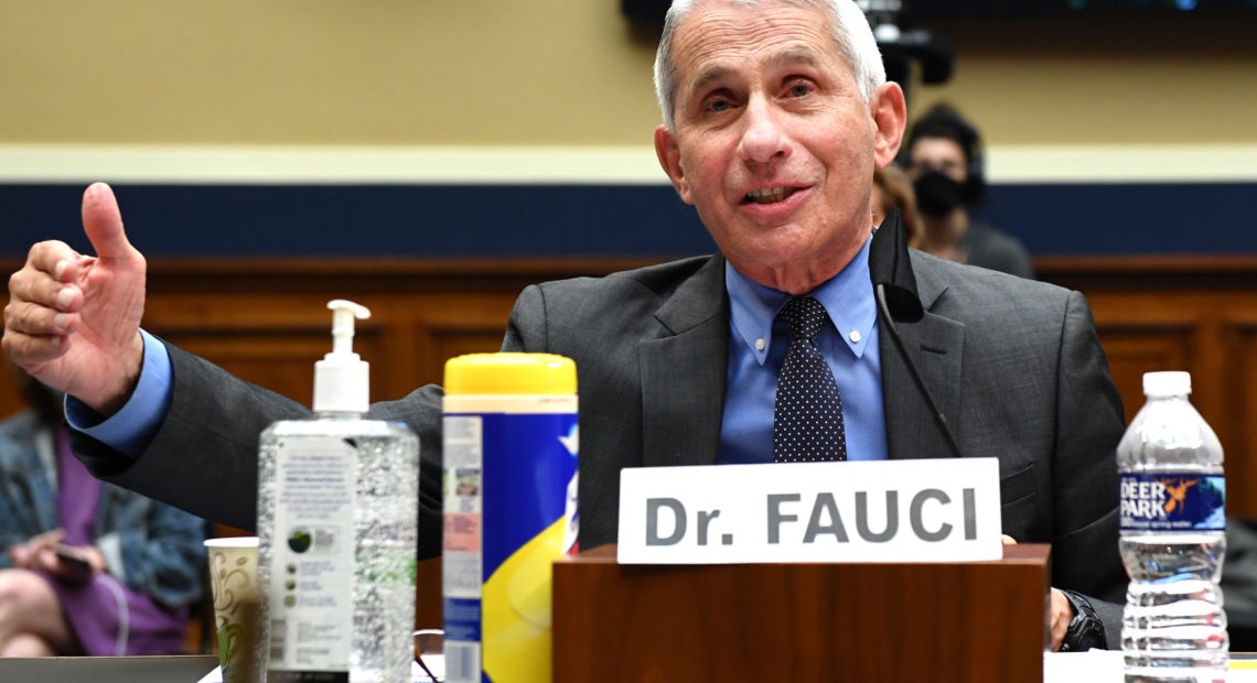 Dr. Anthony Fauci, director of the National Institute of Allergy and Infectious Diseases, testifies Tuesday during a House Energy and Commerce Committee hearing on the Trump administration's response to the COVID-19 pandemic. Kevin Dietsch/AFP via Getty Images