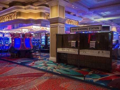 Hand washing stations now share the casino floor with slot machines at the Bellagio. It's part of a move to ramp up hygiene protocols ahead of the establishment's reopening on June 4. CREDIT: David Fuchs/KUER