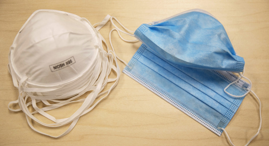 N95 particulate respirator masks (left) block at least 95% of small airborne particulates in the air. However, they are still in short supply and should be reserved for medical workers. Surgical face masks (right) are most effective at protecting others from the wearer's droplets. CREDIT: Victor J. Blue/Bloomberg via Getty Images