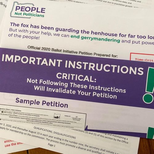 This package was sent to a half-million Oregon households containing petitions for an initiative that would take congressional and legislative redistricting out of the hands of the Oregon Legislature.