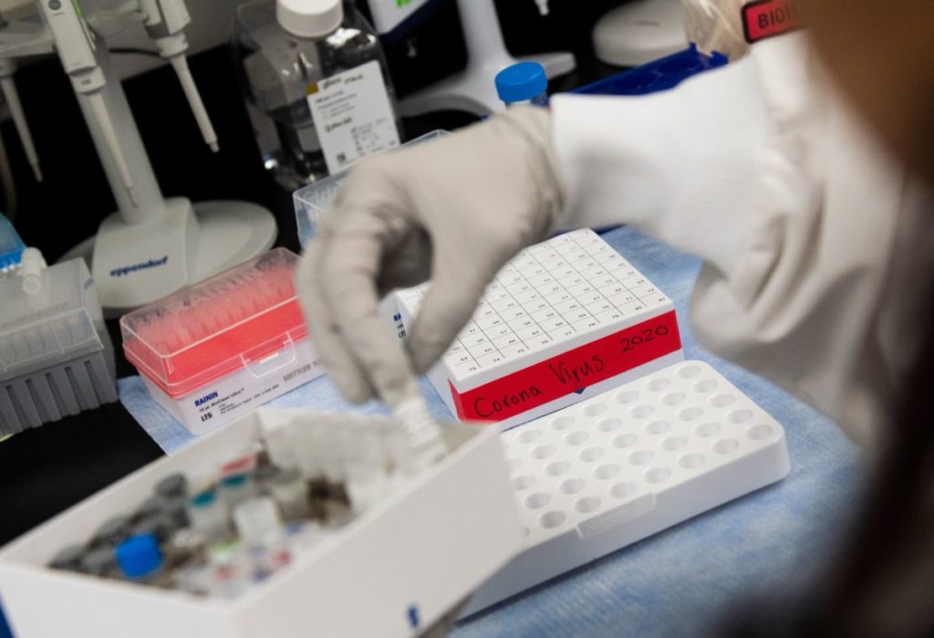 A doctor at Novavax labs in Gaithersburg, Maryland on March 20, 2020, works on developing a vaccine for the coronavirus. CREDIT: Andrew Caballero-Reynolds/AFP