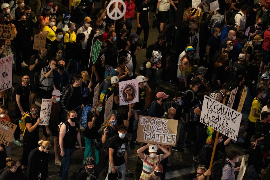 A subsection of the crowd marches toward the Marriott hotel in downtown Portland, Ore., July 25, 2020. Portland has sustained protests against police brutality and systemic racism for 58 days. CREDIT: Bradley W. Parks/OPB