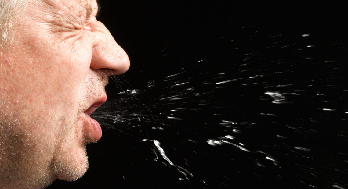 A sneeze can carry the coronavirus pathogen in droplets and in aerosols — and they could land on a surface, making it a fomite. CREDIT: Peter Dazeley/Getty Images