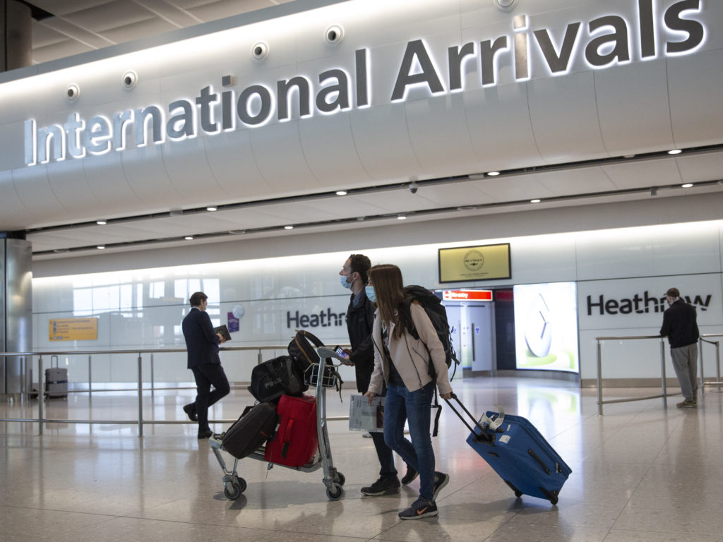 England will soon lift a 14-day quarantine requirement for travelers from more than 50 countries and territories, including Italy, Germany, France and Spain, the Department for Transportation said Friday. The U.S. is not among the exempt countries. CREDIT: Matt Dunham/AP