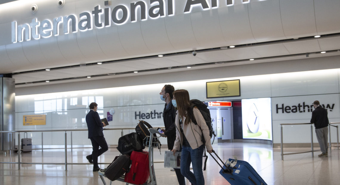 England will soon lift a 14-day quarantine requirement for travelers from more than 50 countries and territories, including Italy, Germany, France and Spain, the Department for Transportation said Friday. The U.S. is not among the exempt countries. CREDIT: Matt Dunham/AP