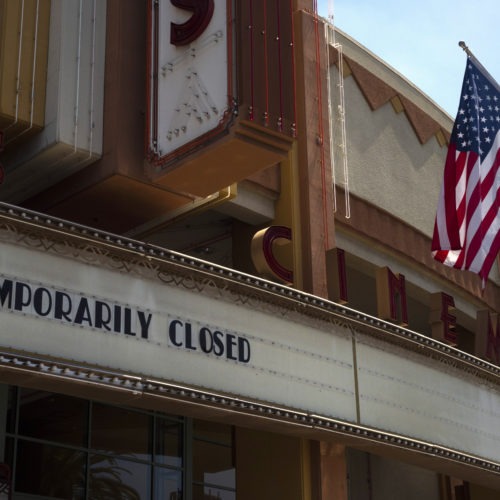 A movie theater is seen closed due to the coronavirus pandemic on July 2, 2020, in Brea, Calif. The U.S. economy shrank at a record 32.9% rate in the second quarter as the pandemic cost tens of millions of jobs. CREDIT: Jae C. Hong/AP