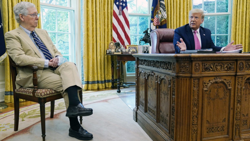 Senate Majority Leader Mitch McConnell, R-Ky., left, with President Trump at the White House. The GOP has unveiled a new pandemic relief bill but tough negotiations lie ahead with Democrats. Evan Vucci/AP