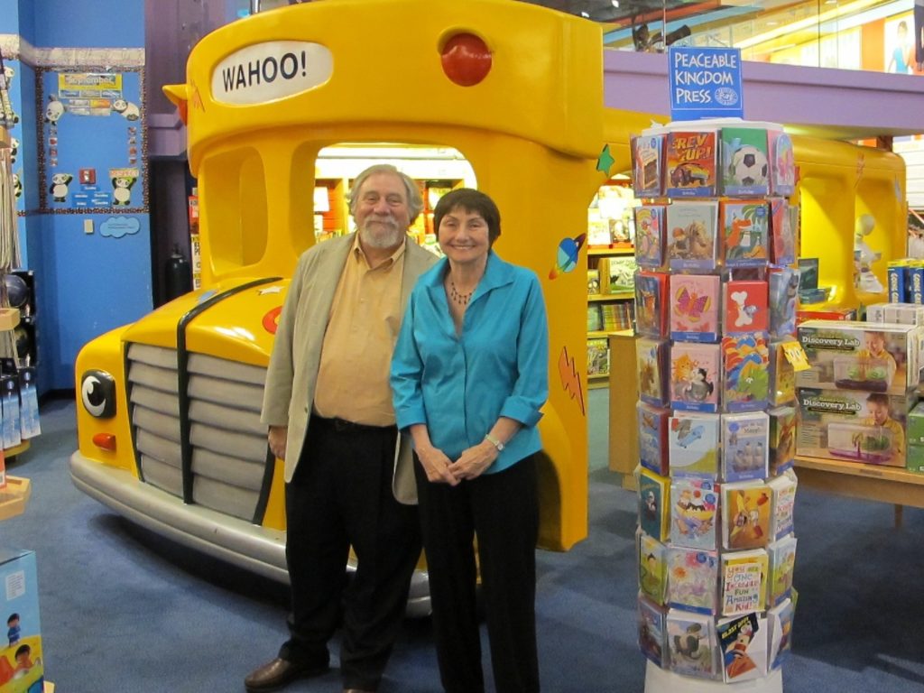 The creators of The Magic School Bus series: illustrator Bruce Degen and author Joanna Cole, posing at the Scholastic Store in New York City in an undated photo. Courtesy of Scholastic