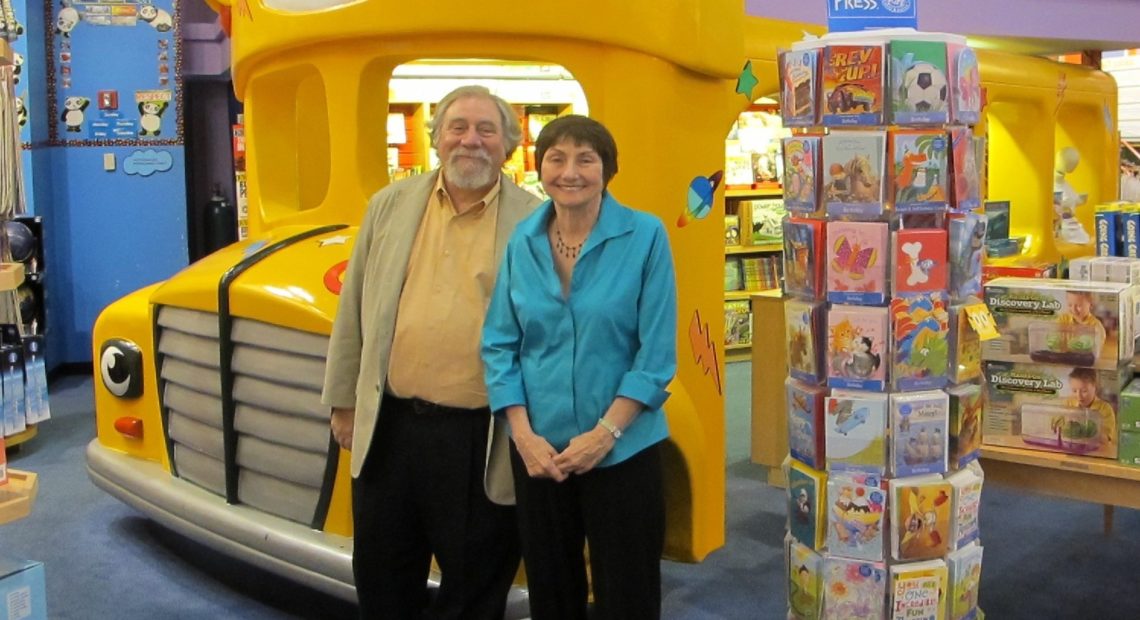 The creators of The Magic School Bus series: illustrator Bruce Degen and author Joanna Cole, posing at the Scholastic Store in New York City in an undated photo. Courtesy of Scholastic