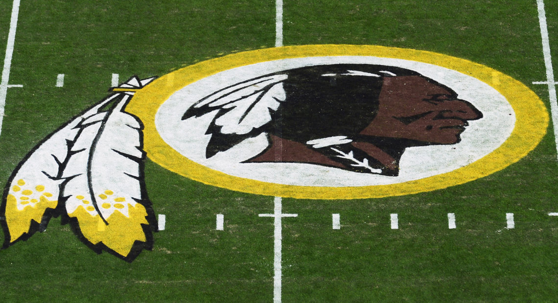 A view of the Washington NFL team's logo at center field before a game between the Detroit Lions at FedExField on November 2019 in Landover, Maryland. Patrick CREDIT: McDermott/Getty Images