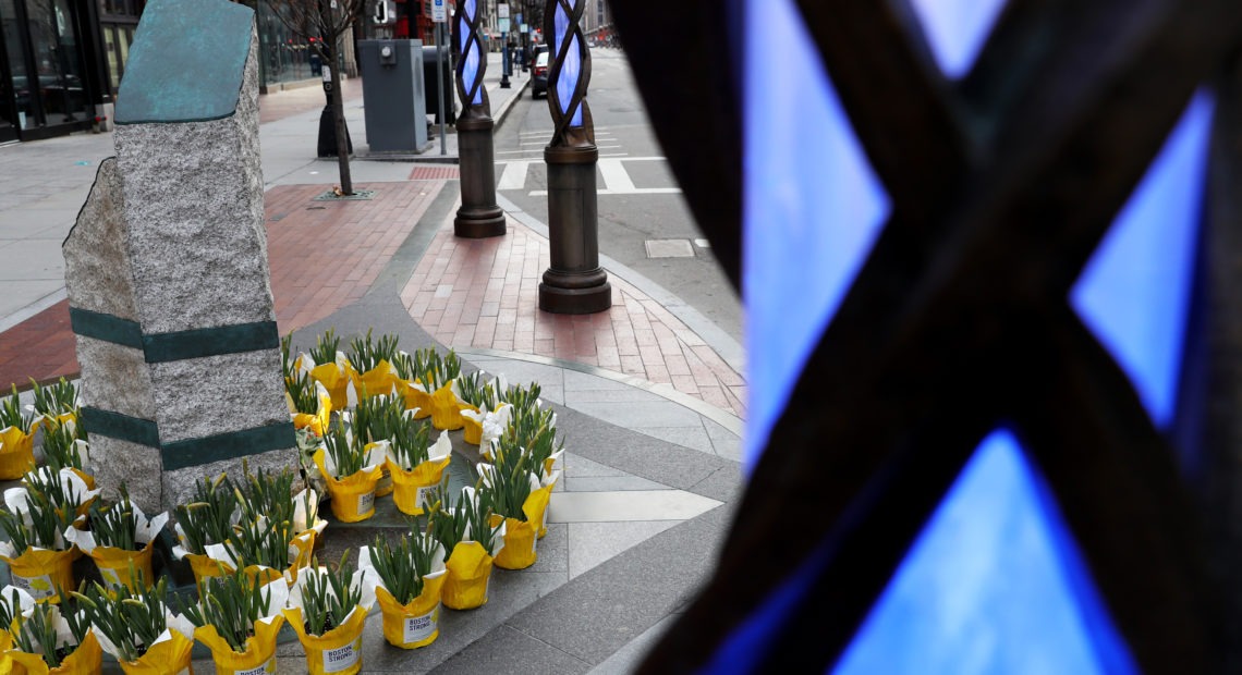 Flowers are placed at the memorial to the victims of the 2013 Boston Marathon bombings on April 20. Maddie Meyer/Getty Images
