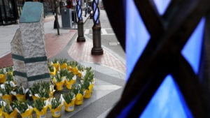Flowers are placed at the memorial to the victims of the 2013 Boston Marathon bombings on April 20. Maddie Meyer/Getty Images