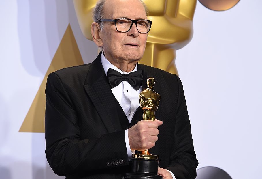 Composer Ennio Morricone, posing with his Oscar for The Hateful Eight in 2016. He died Monday at age 91 in Rome. Robyn Beck/AFP/Getty Images