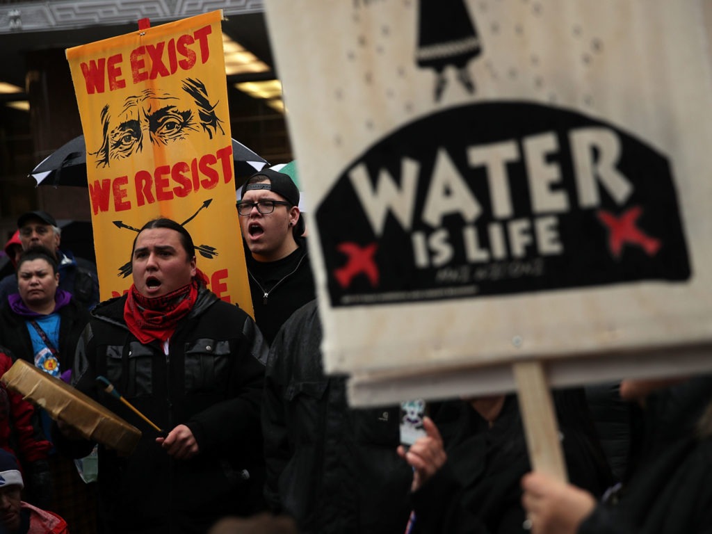 Members of the Standing Rock Sioux tribe and its supporters, shown here during a demonstration in 2017, have opposed the Dakota Access Pipeline for years. CREDIT: Alex Wong/Getty Images