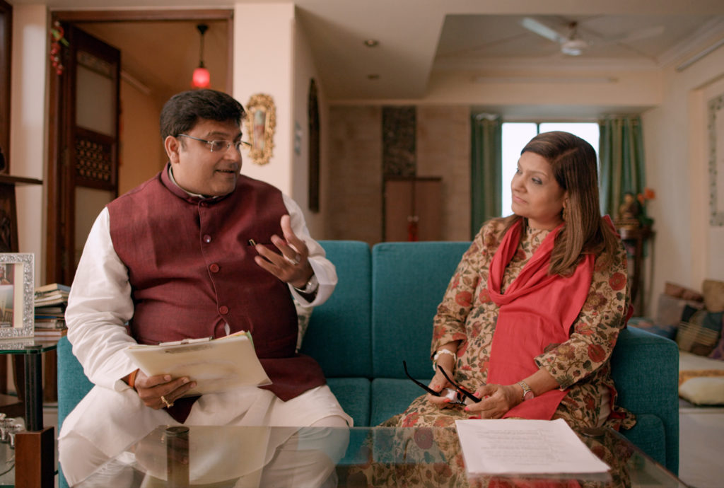 Sima Taparia (right) is a jet-setting matchmaker from Mumbai. Here she confers with astrologer Pundit Sushil ji, who helps her come up with prospective mates for her clients. Netflix