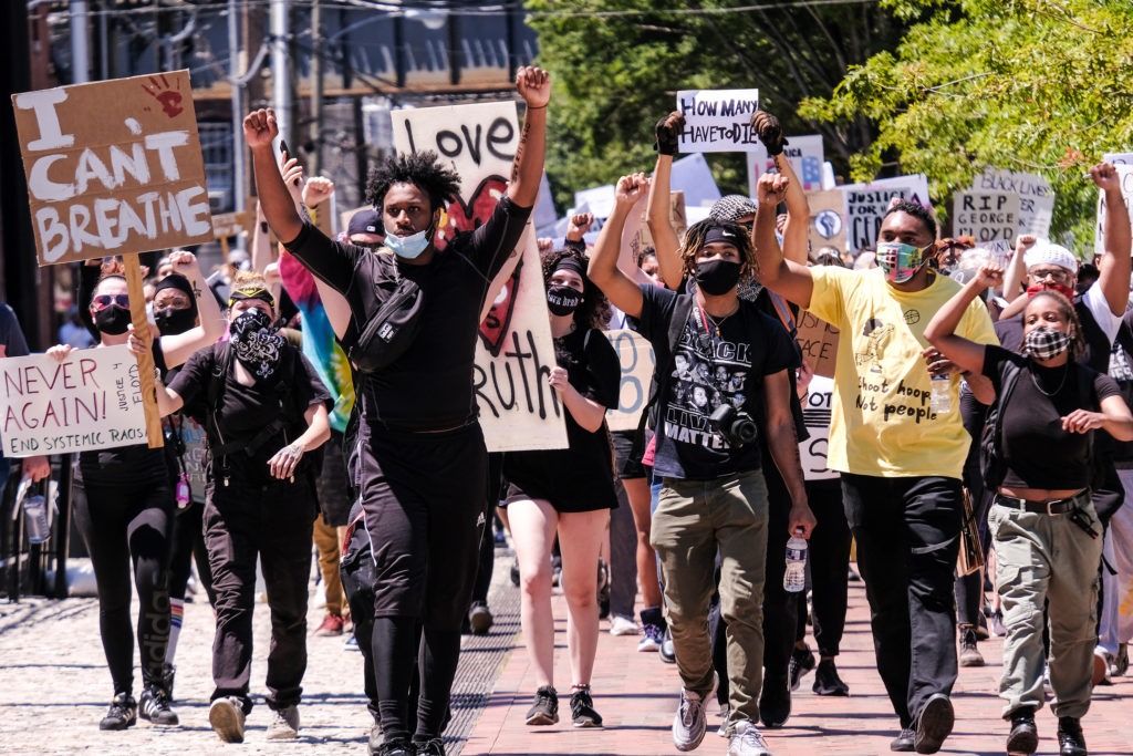 A crowd of peaceful protesters march through downtown Richmond, from Brown's Island to the 17th Street Market in Shockoe Bottom, June 7. CREDIT: Sandra Sellars/ Richmond Free Press