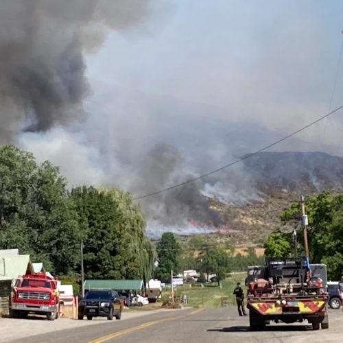 Fire crews were in the town of Loomis, on the Palmer Fire's southwestern edge, Aug. 22-23. The conducted burnout operations to help clear fuel. CREDIT Alan Lebovitz/WA DNR